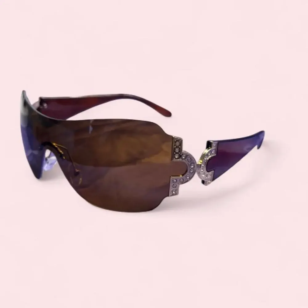 Brown shield sunglasses featuring oversized rimless lenses rhinestone luxe y2k